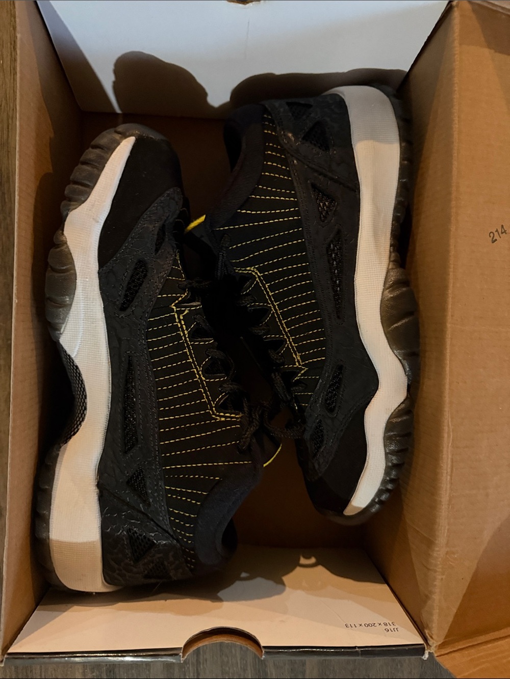 Jordan Women's Black Sneakers with Yellow Stitching and White Midsole